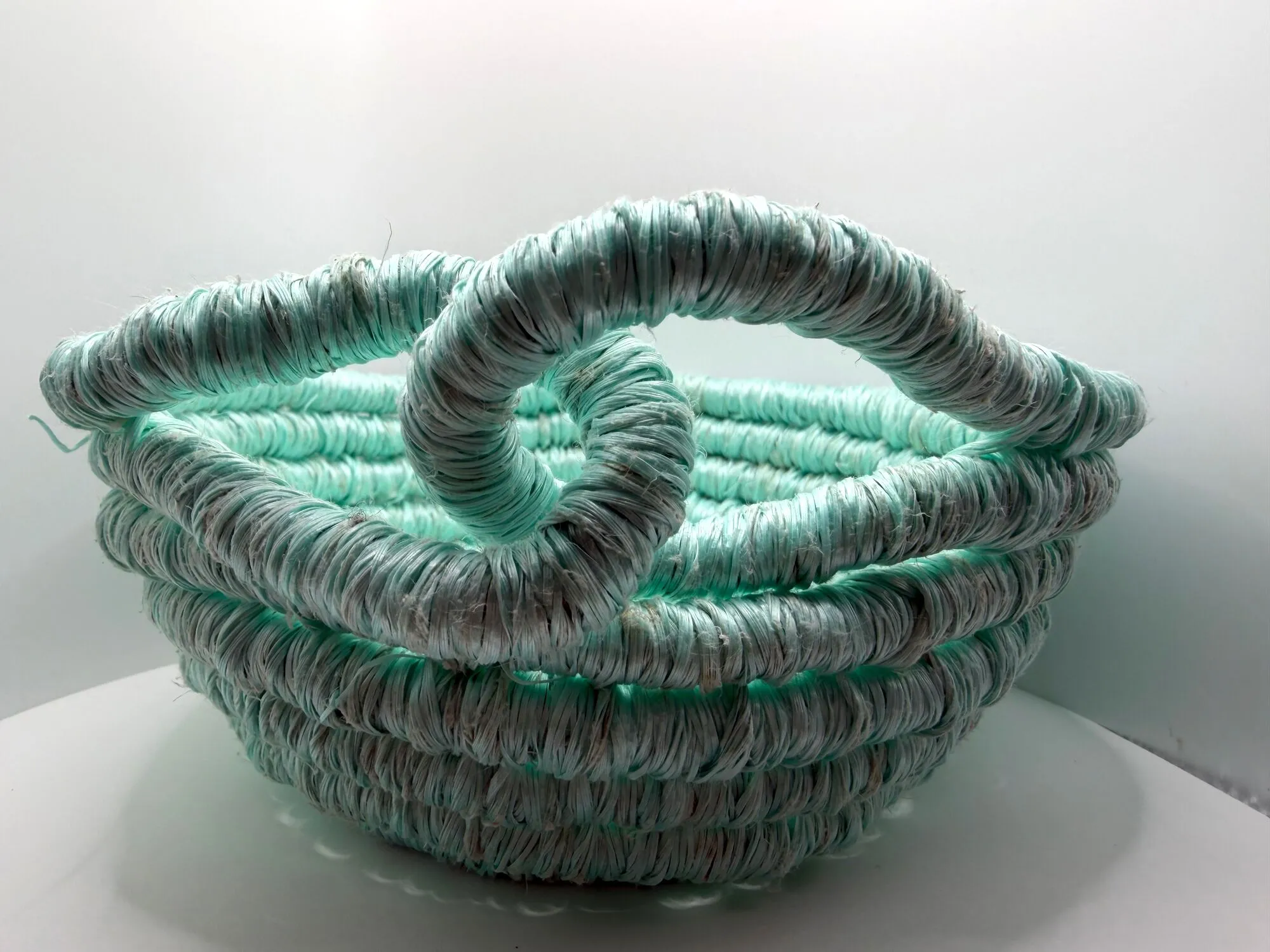 Aqua rope basket with a looped handle