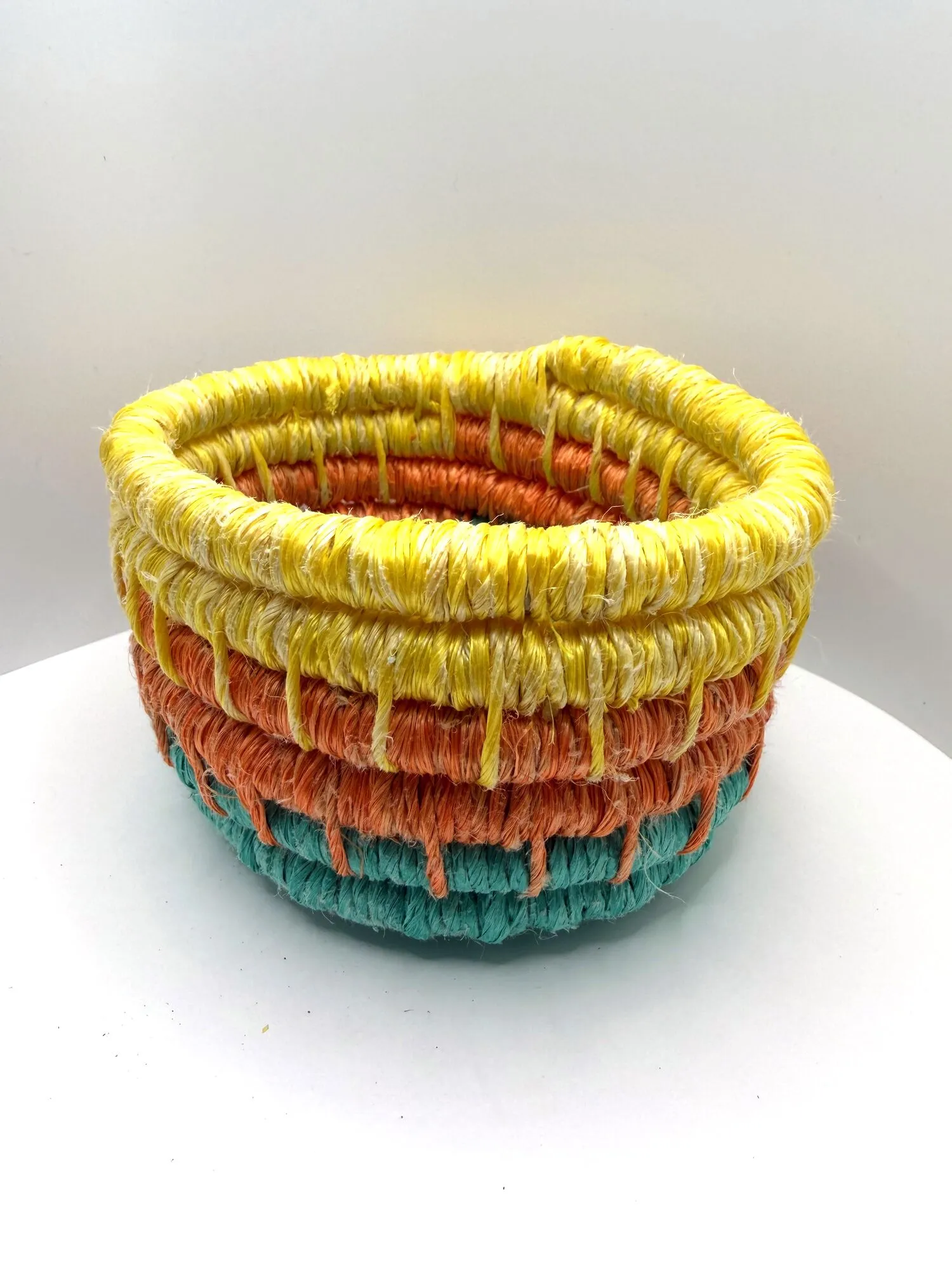 Rope bowl striped yellow, coral, and aqua